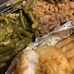 Large portion of fried fish with green String Beans on the soft side and Black-Eyed-Peas was so so, will try again