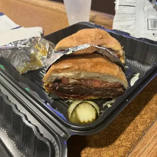 a sandwich and pickles