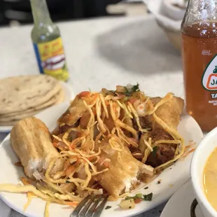 a bowl of soup and a plate of food