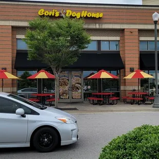 a car parked in front of the store