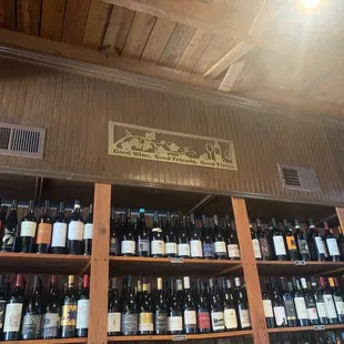 shelves of wine in a wine shop