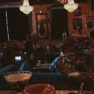 Inside vibes with drinks and pretzel