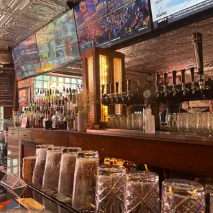 a bar with a variety of drinks