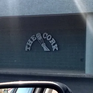 One of the signs is on the side of the building.