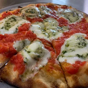 Spiral Margherita Pizza fired on our stone oven