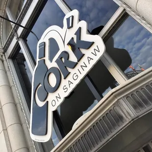 Cork on Saginaw front entrance sign