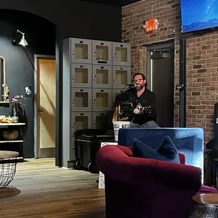 a man playing a guitar