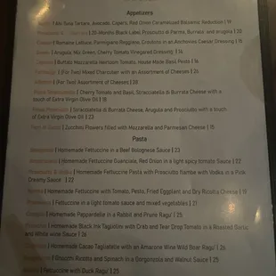 a menu on a wooden table