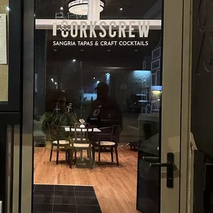 the front door of a coffee shop