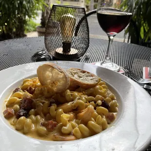 Mac &apos;n cheese with shrimp and pork belly.