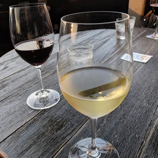 two glasses of wine on a table
