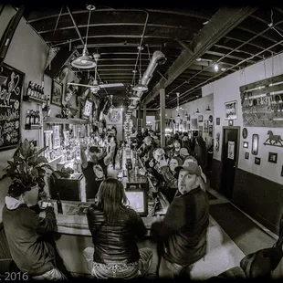 people sitting at the bar