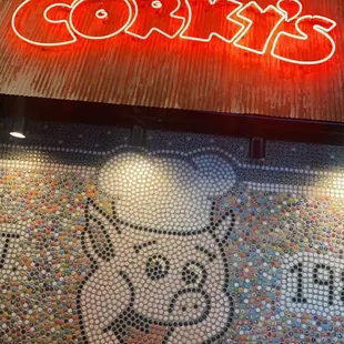ows the neon sign