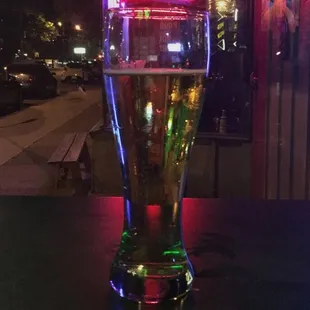 a glass of beer on a table