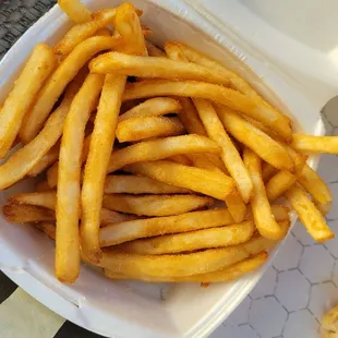 fries in a styrofoam container