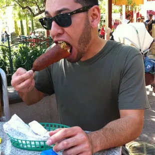 Enjoying his corndog ;)