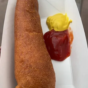 corn dog with ketchup and ketchup