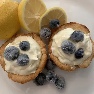 Lemon cream tartlet with candied blueberry toppers