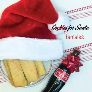a santa hat and a bottle of coke