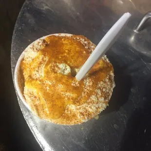 a donut with a fork sticking out of it