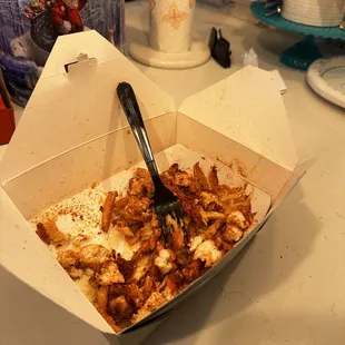 Crispy fries, crispy well seasoned chicken, parmesan with there special sauce and of course some delicious corn.