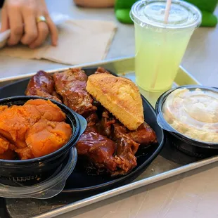 December 25, 2022; Ribs (4) with candied yams and potato salad ($25.99); lemonade ($3.50).