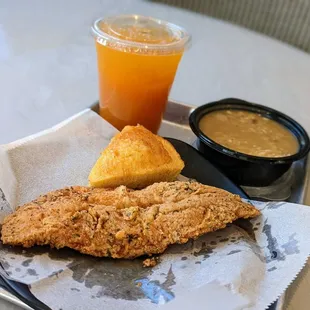 December 25, 2022; Fried catfish with white rice and turkey gravy ($13.99); southern twang ($4).