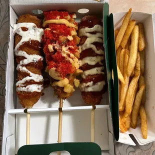 Umami dog, potato dog, garlic sweet chili dog, fries with kimchi powder