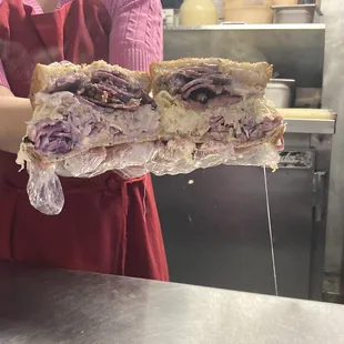If that&apos;s not a sandwich, I don&apos;t know what is... Identity Crisis w/ angry sauce + sauerkraut hold the slaw.