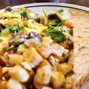 a plate of food and a cup of coffee