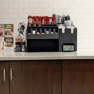 Ketchup, straws, and lids