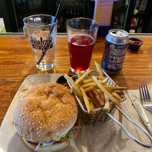 Classic burger with American cheese jalapeños and Rosemary french fries
