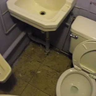 Gotta love restrooms with more fixtures than the number of people that can possibly fit in the room.