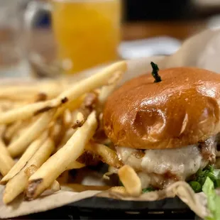 a burger and fries on a plate