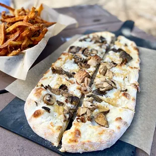 Detroit mushroom company flatbread made vegan and garlic fries
