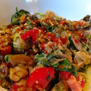 a bowl of food with vegetables