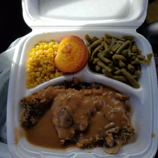 Baked meatloaf, green beans, kernel corn &amp; a muffin.