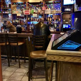 a man sitting at a bar