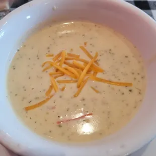 Broccoli cheddar soup, creamy with carrots.