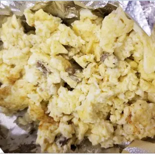 Breakfast scramble with eggs, potatoes, sausage and cheese....nope just eggs and a few pieces of sausage. They were beyond gross