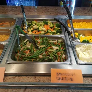 Stir fry vegs and green beans, Mac &amp; cheese, broccoli and cheese and mashed potatoes