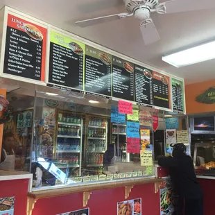a woman standing at a counter