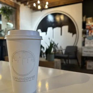 a cup of coffee on a table