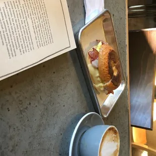 Nordic latte and Asiago breakfast sandwich