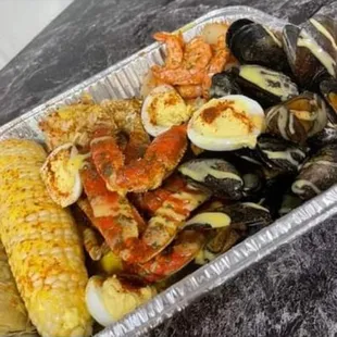 The seafood boil is one of my favorites 1pd of snow crab legs 1pd shrimp  1pound of mussels  1 corn  4 eggs Seasoned perfect.
