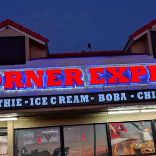 the front of a restaurant at night