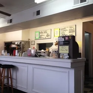 a view of a restaurant counter