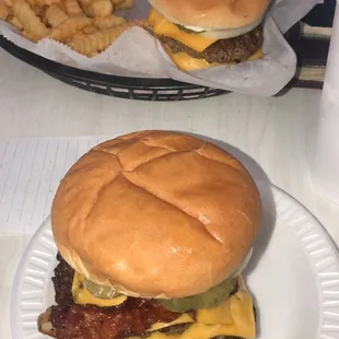 two burgers and french fries
