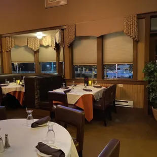 The main level dining room that adjoins the marina.