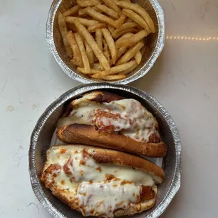 two hot dogs and french fries